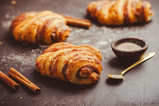 Cinnamon rolls or Franzbroetchen -  Germany sweet pastry sweet pastry baked with butter and cinnamon,  croissant