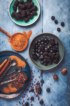 Organic Blueberry and blackberry berries, cinnamon, brown sugar and cocoa, baking ingredients