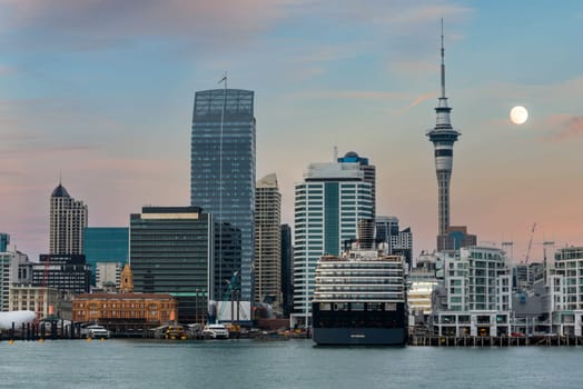 AUCKLAND, NEW ZEALAND - JANUARY 24, 2023 - Moon over the skyline of Auckland, New Zealand