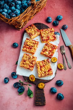 Homemade vegan German plum cake (Zwetschgenkuchen) with yeast dough and crumbles