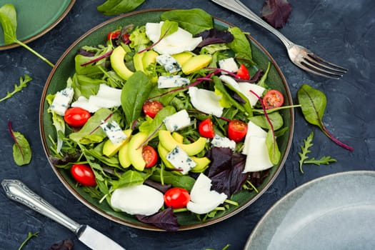 Diet salad of fresh vegetables, herbs and cheese. Healthy food