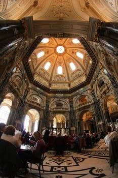 VIENNA, AUSTRIA- NOVEMBER 02, 2022 - Scenic cafe beneath the cupola of the Natural history museum in Vienna, Austria