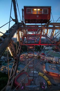 Riding with the famous Viennese ferris wheel in the evening, Austria