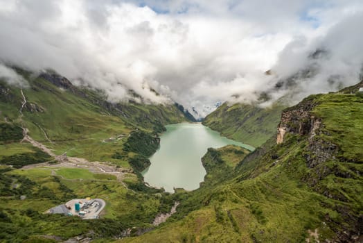 Scenic panoramic view from the reservoirs and its alpine landscape near Kaprun in the Austrian Alps