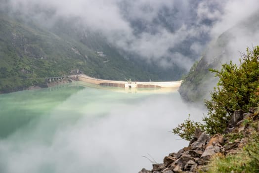 Impressing dam wall from the Mooserboden reservoir near Kaprung, Austrian Alps