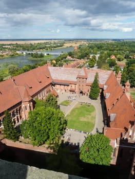 MALBORK, POLAND - SEPTEMBER 03, 2020 - Castle of the Teutonic Order in Malbork, view from the high tower, Poland