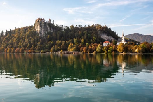 Peaceful view on lake Bled and the island with its pilgrimage church Assumption of Mary, The Slovenian Alps