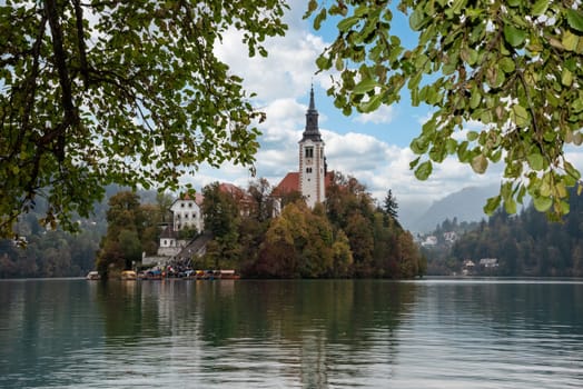 Peaceful view on lake Bled and the island with its pilgrimage church Assumption of Mary, The Slovenian Alps