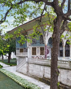 Exterior shot of Baghdad Kiosk, or Bagdat Kosku, located at the Fourth Courtyard of Topkapi Palace, decorated with floral blue mosaic tiles, Istanbul, Turkey