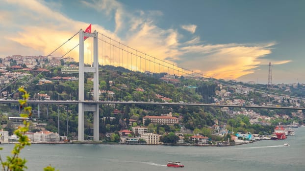 Aerial sunrise shot of Istanbul city from Fethi Pasha Grove overlooking Bosphorus strait, with Bosphorus Bridge, or Bogazici Koprusu, connecting Europe and Asia, Istanbul, Turkey