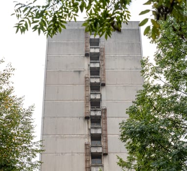 Derelict old fire escape at the facade of a residential building in Ljubljana, Slovenia