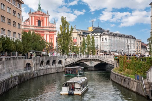 Promenade at the Ljubljanica river in downtown Ljubljana in autumn, Slovenia