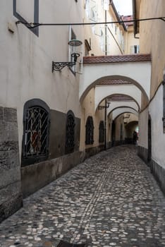 Small alley leading to the fish market in the center of Ljubljana, Slovenia