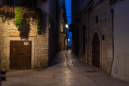 Abandoned typical alleyway in downtown Vieste, Southern Italy