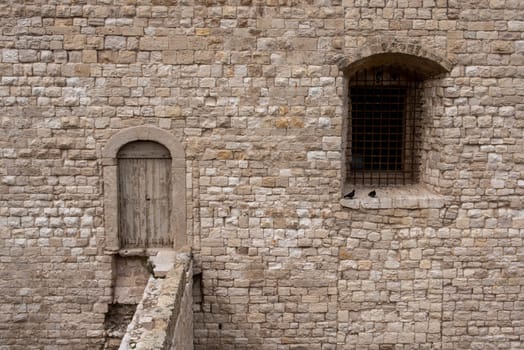 Door and window at the castle of Trani, Southern Italy