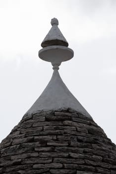 Typical pilled stone roof of a trullo in Alberobello, Italy