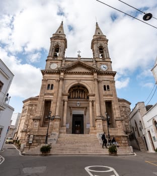 Scenic portal of Basilica of Saints Cosmas and Damian in Alberobello, Southern Italy