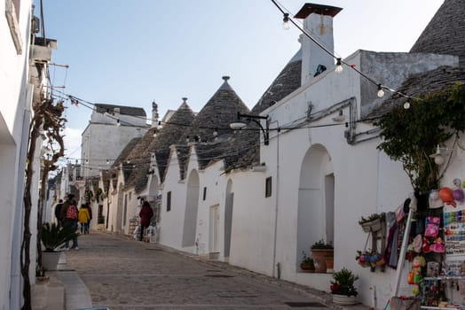 Iconic residential houses in historic Trulli district in Alberobello, Italy