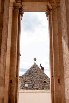Scenic portal of Basilica of Saints Cosmas and Damian in Alberobello, Southern Italy
