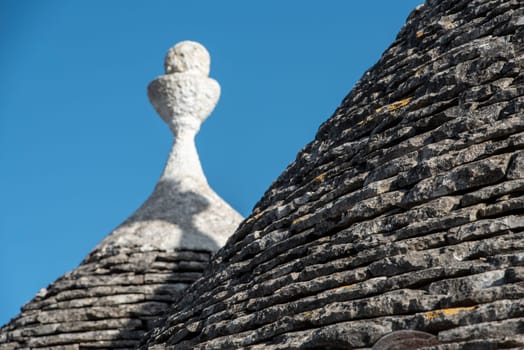 Iconic residential houses in historic Trulli district in Alberobello, Italy