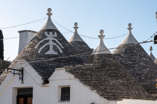 Iconic residential houses in historic Trulli district in Alberobello, Italy