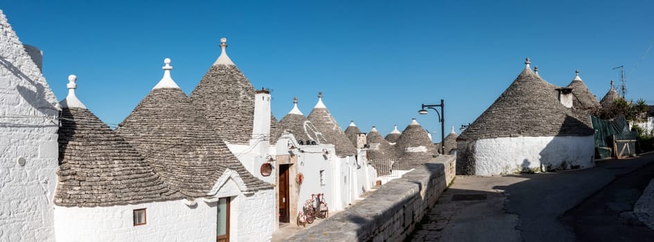 Iconic residential houses in historic Trulli district in Alberobello, Italy