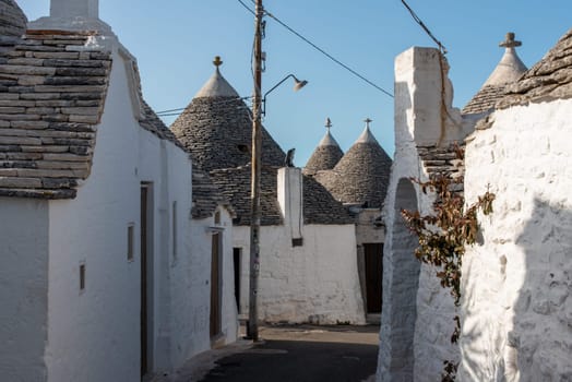 Iconic residential houses in the historic Trulli district in Alberobello, Italy