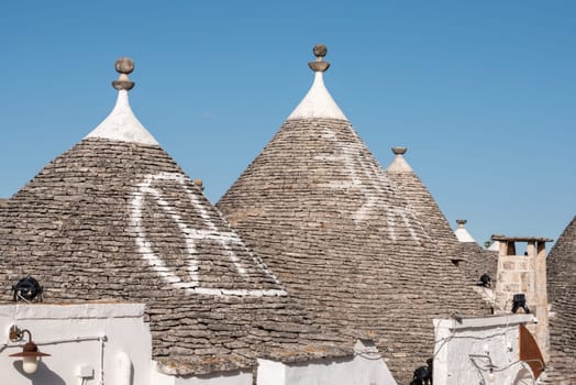 Iconic residential houses in historic Trulli district in Alberobello, Italy