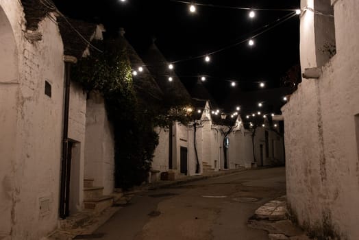 Scenic abandoned street in the Trulli district of Alberobello, Southern Italy