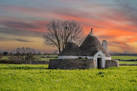 Scenic Trullo dwelling in the rural landscape near Alberobello, Southern Italy