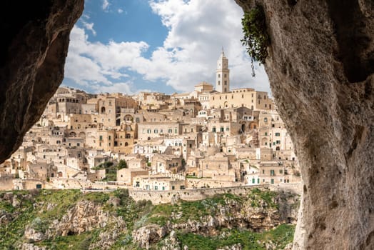 Scenic view of historic downtown with its cathedral, photo taken from a cave house, Italy
