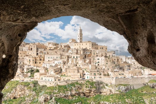 Scenic view of historic downtown with its cathedral, photo taken from a cave house, Italy