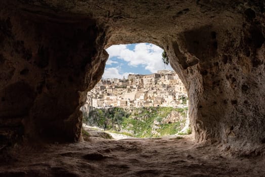 Scenic view of historic downtown with its cathedral, photo taken from a cave house, Italy