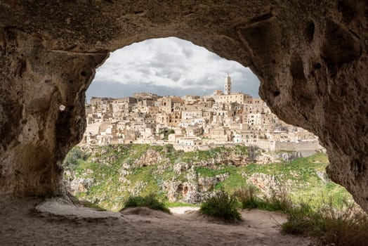Scenic view of historic downtown with its cathedral, photo taken from a cave house, Italy