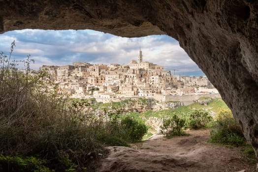 Scenic view of historic downtown with its cathedral, photo taken from a cave house, Italy