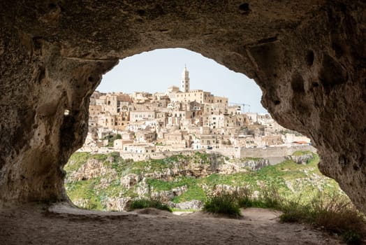 Scenic view of historic downtown with its cathedral, photo taken from a cave house, Italy