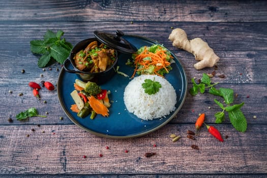 famous fresh ginger chicken cassolette with sticky rice and vegetables