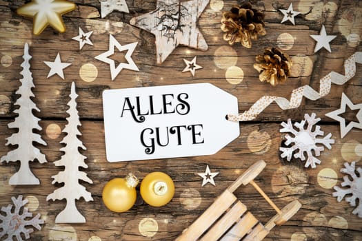 Rustic Wooden Bokeh Christmas Background, Winter Decoration With Label With German Text Alles Gute, Which Means Best Wishes In English