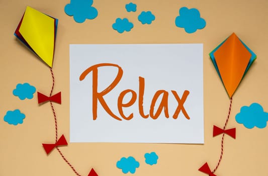 Autumn Background With Paper Kites, Clouds and Fall Decoration, With Text Relax
