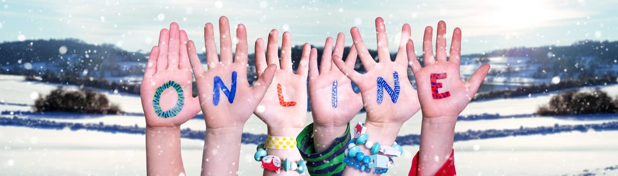 Children Hands Building Colorful English Word Online. White Winter Background With Snowflakes And Snowy Landscape.