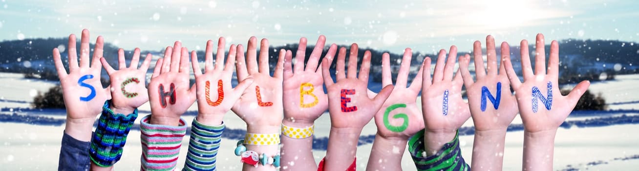Children Hands Building Colorful German Word Schulbeginn Means First Day Of School. White Winter Background With Snowflakes And Snowy Landscape.
