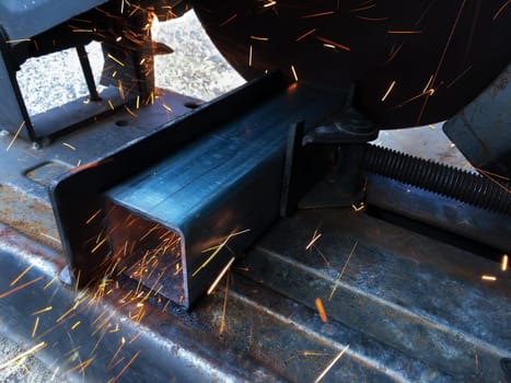 Cutting Metal, Machine steel cutting tool blurred background, Construction concept