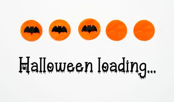White Halloween Background With Orange Dots And Black Bats And Text Halloween Loading