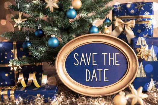 Oval Golden Frame With Text Save The Date, Blue And Golden Decorated Christmas Tree As Winter And Christmas Background