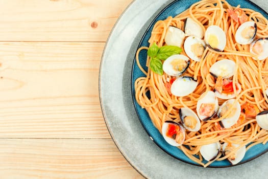 Seafood pasta with clams alle vongole and spaghetti. Copy space
