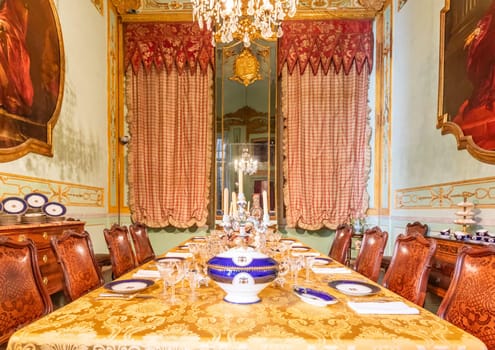 Genova, Italy - 8 August 2023: Spinola Palace. Vintage luxury dining room, elegant furniture - table and chairs