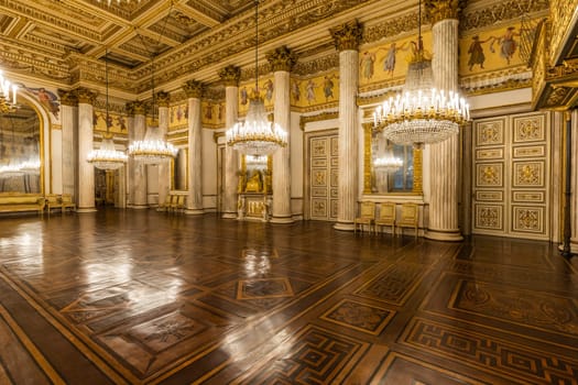 Turin, Italy - Circa January 2022: romantic old ballroom interior in Royal Palace, 1842
