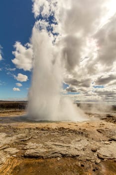 Haukadalur geyser in Iceland erupting on a sunny day, Iceland