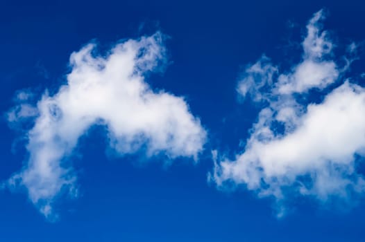 White cumulus clouds against the blue sky. White clouds. Blue sky. Fluffy cloud. Clear sunny day. Weather. Weather forecast. Summer season. Beauty in nature. Outdoors.