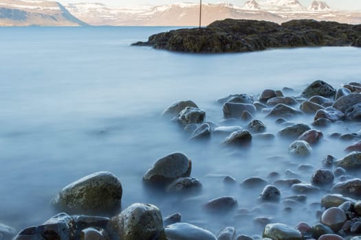 Time exposure of stones in the Westfjords coast, Iceland